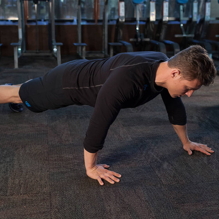 Staggered Push-Up Exercise Guide and Video