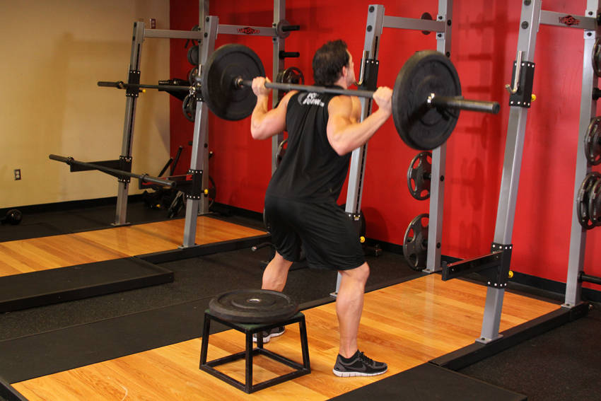 Barbell Squat To A Bench Exercise Guide And Video