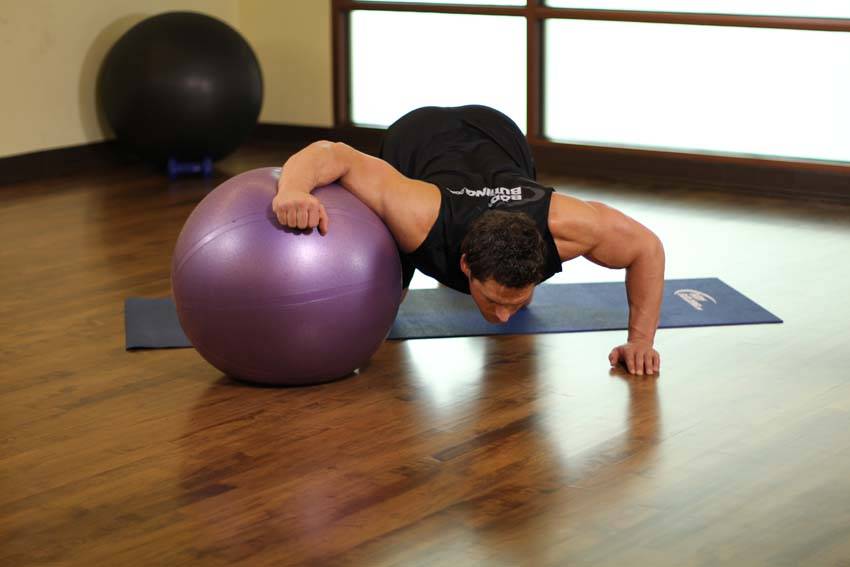 Chest Stretch on Stability Ball Exercise Guide and Video